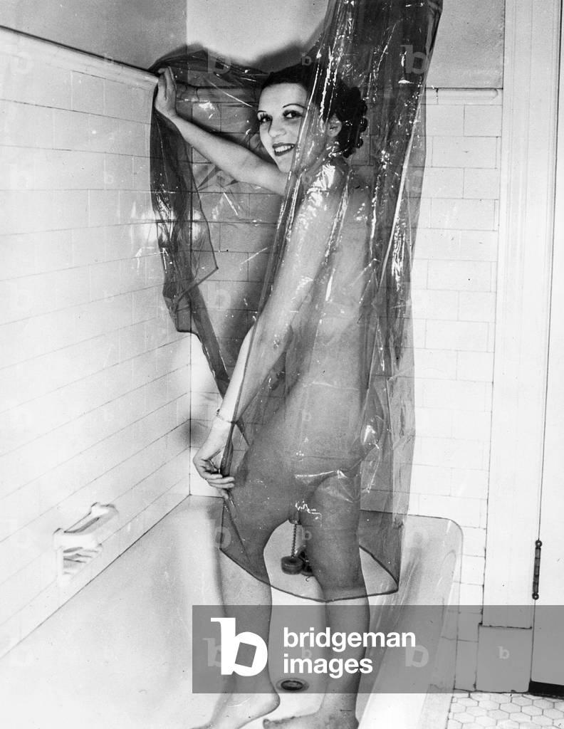 Woman in the shower, 1936 (b/w photo)