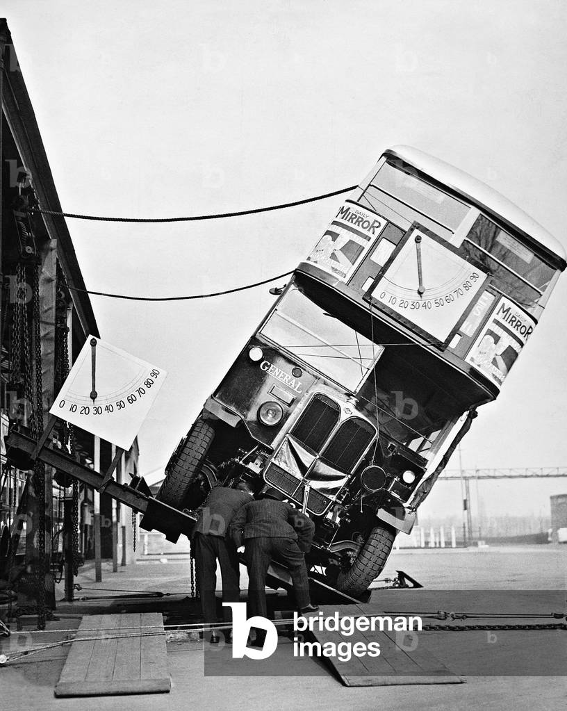 Safety test for a London double-decker bus, 1933 (b/w photo)