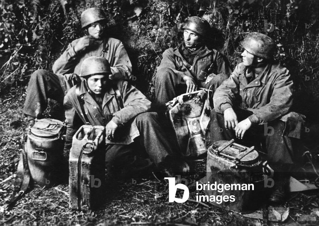 Food carriers of a German paratroop unit in Normandy, 1944 (b/w photo)