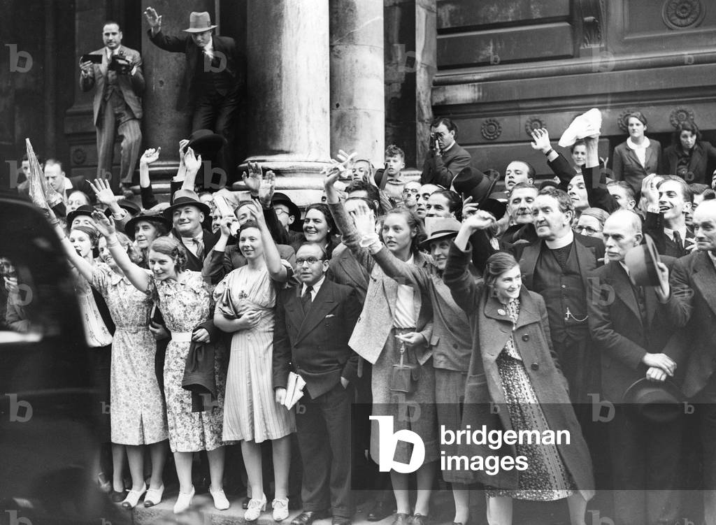 Cheering crowd, 1939 (b/w photo)