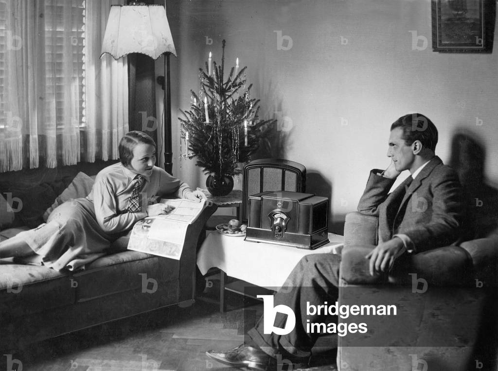 Couple at Christmas time, 1932 (b/w photo)
