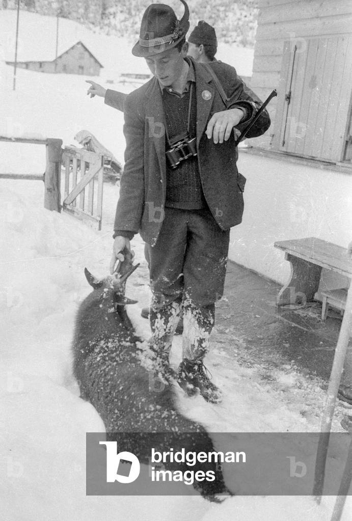 Prime Minister Ion Gheorghe Maurer hunting chamois, 1965 (b/w photo)