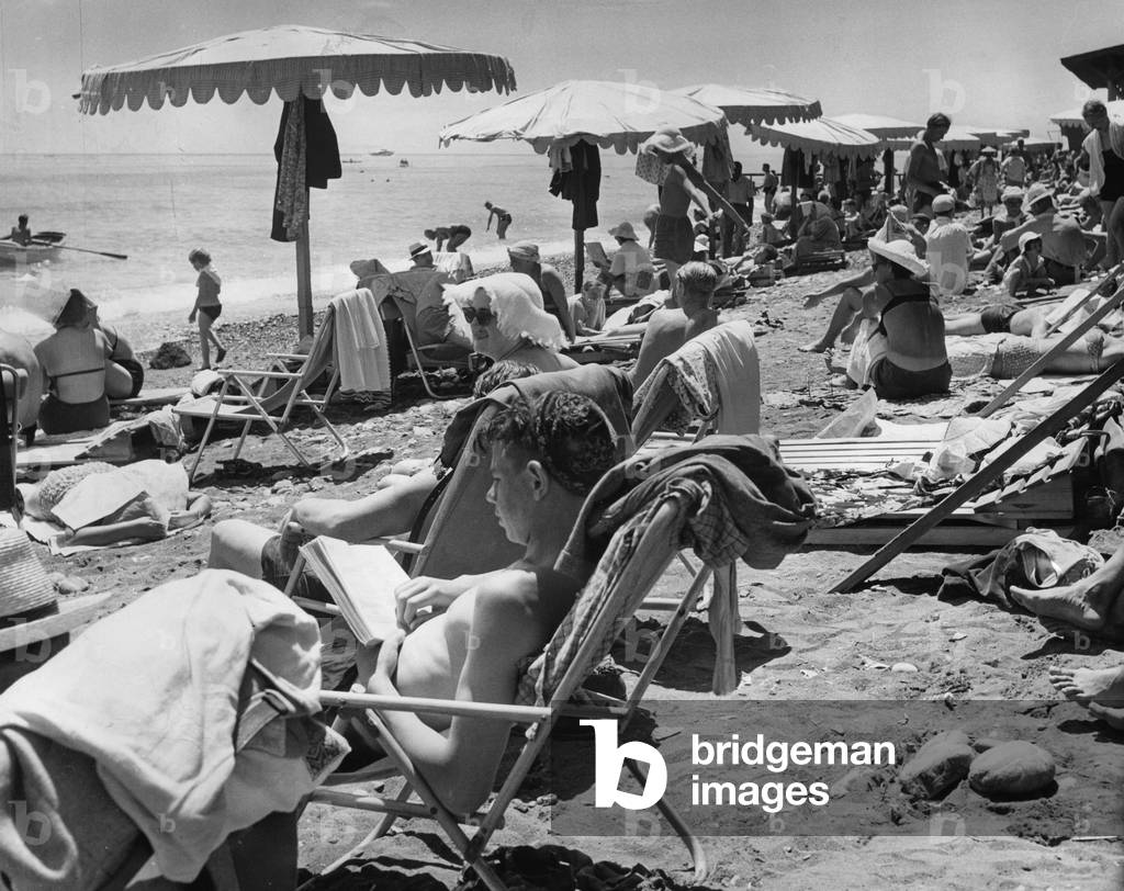 Holidaymakers on the beach in Yalta, 1960 (b/w photo)