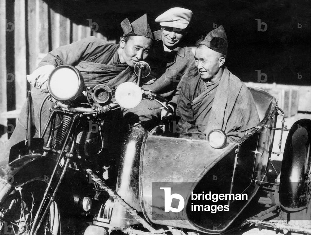 Buddhist monks with motorcycle with sidecar, 1931 (b/w photo)