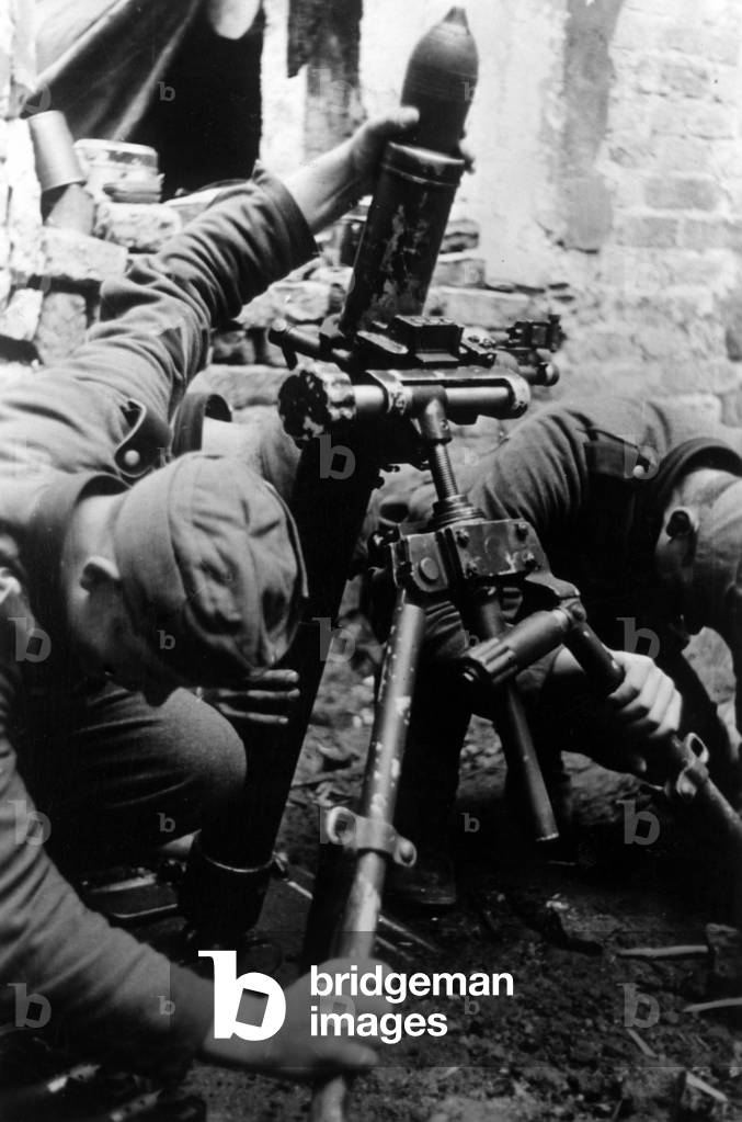 Production of grenade launchers in Kholm, 1942 (b/w photo)