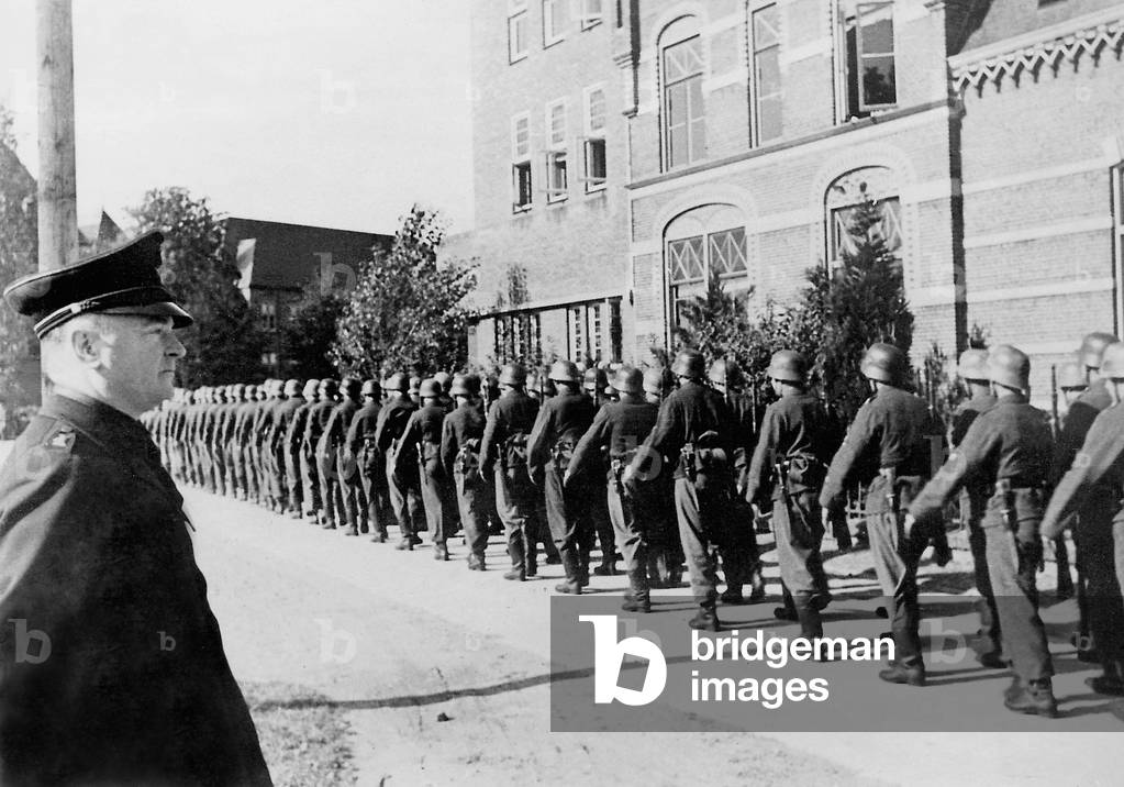 Anton Mussert inspecting Dutch volunteers, 1944 (b/w photo)