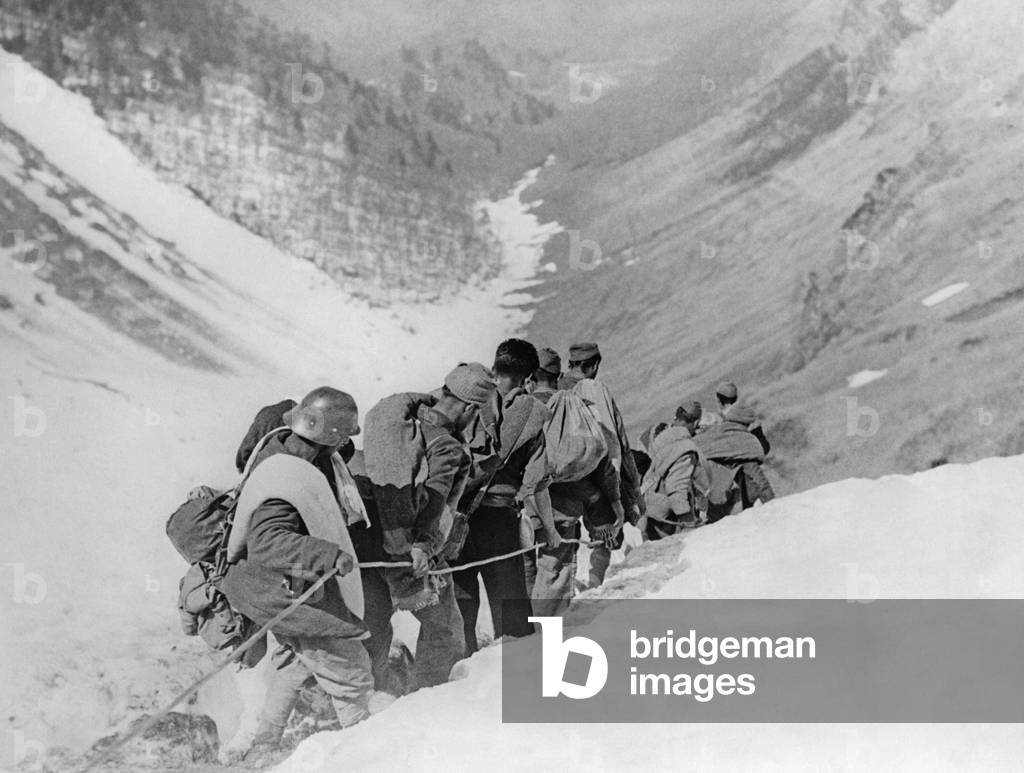 Republican fighters descend a mountain slope, 1938