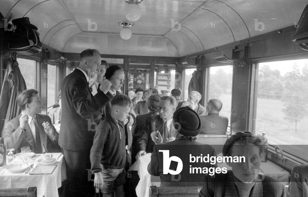 Dining car of a interzonal train, 1954 (b/w photo)