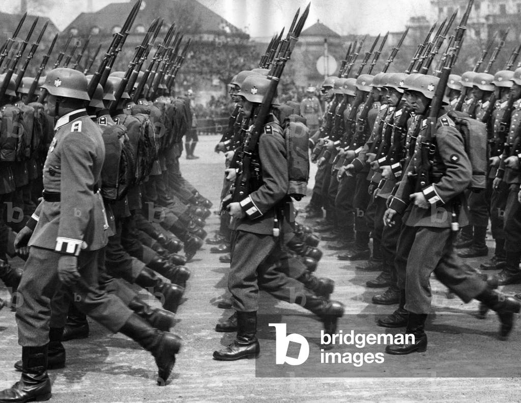 Wehrmacht soldiers parading through Berlin, 1938 (b/w photo)