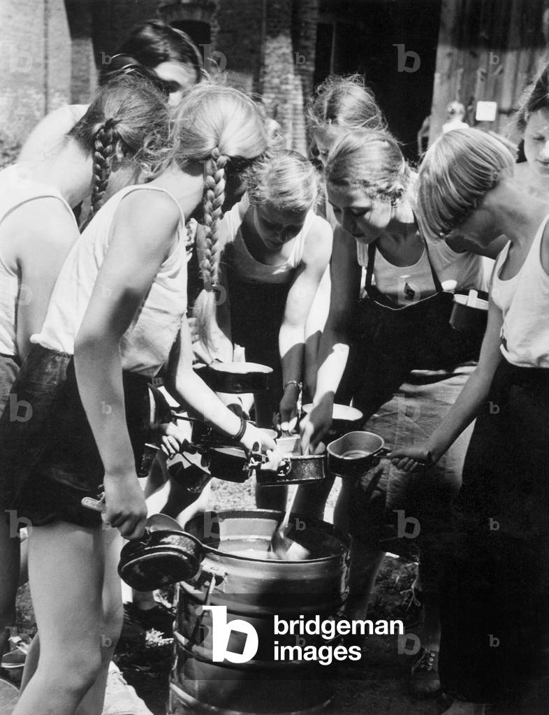 German Jungmaedel (Young Girls) at the serving the meals, 1938 (b/w photo)