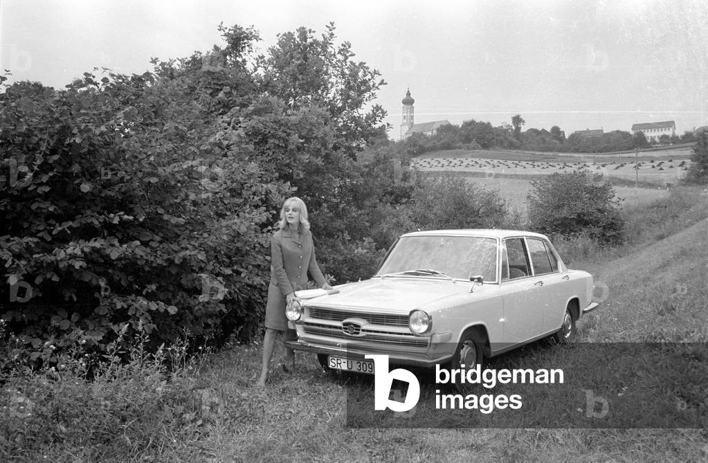 A woman posing with a Glas 1700, 1963 (b/w photo)