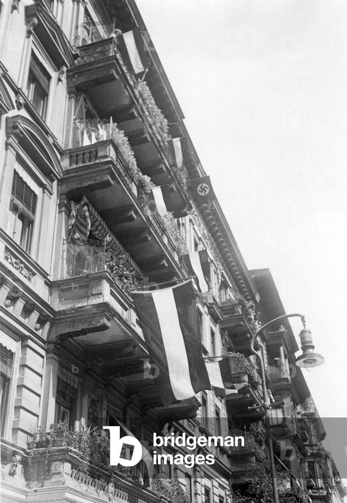 Black-white-red flags on a residential house, 1932