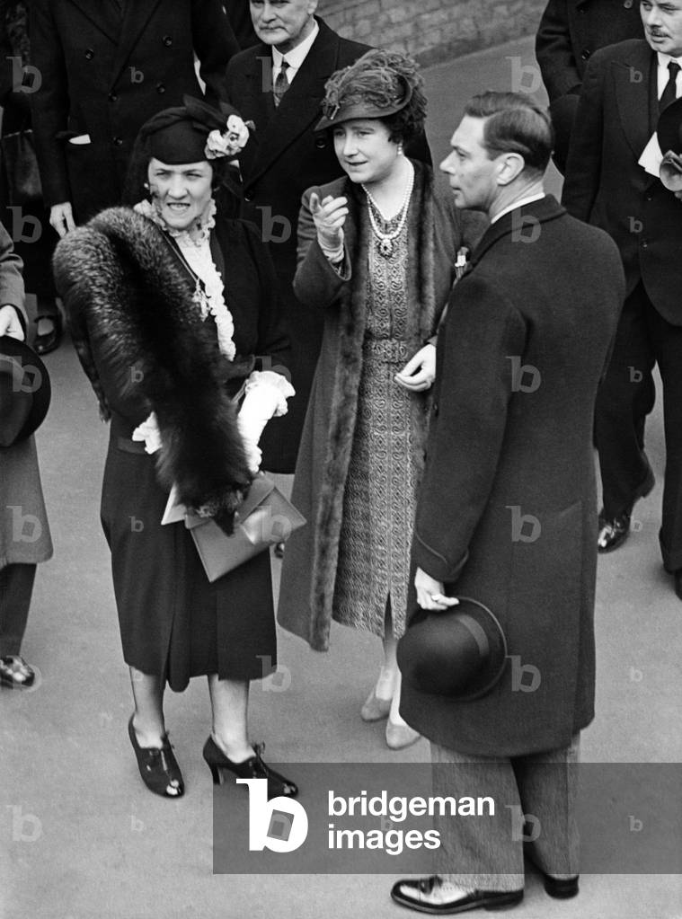Queen Elizabeth and King George VI visit the slums of London, 1938 (b/w photo)