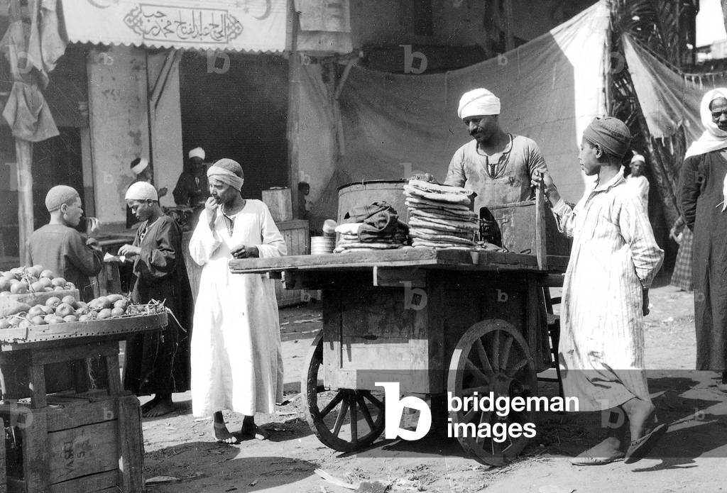 A street trader in Cairo (b/w photo)