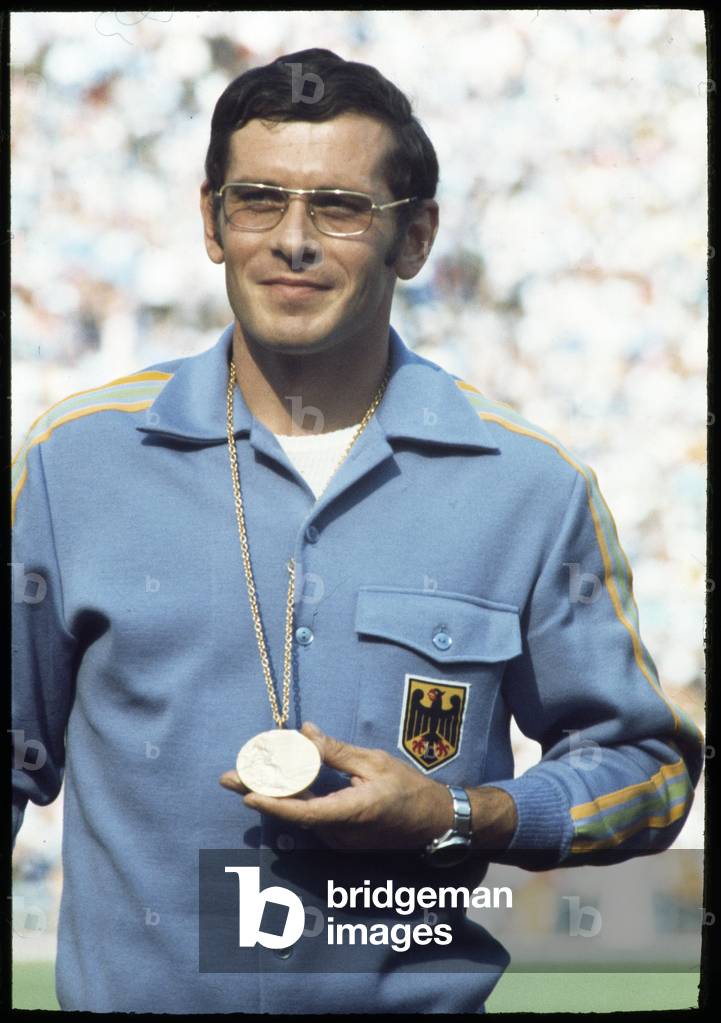 Bernd Kannenberg with his gold medal, 1972 (b/w photo)