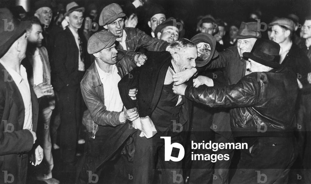 Strike riots in a steel plant in Aliquippa, 1937 (b/w photo)