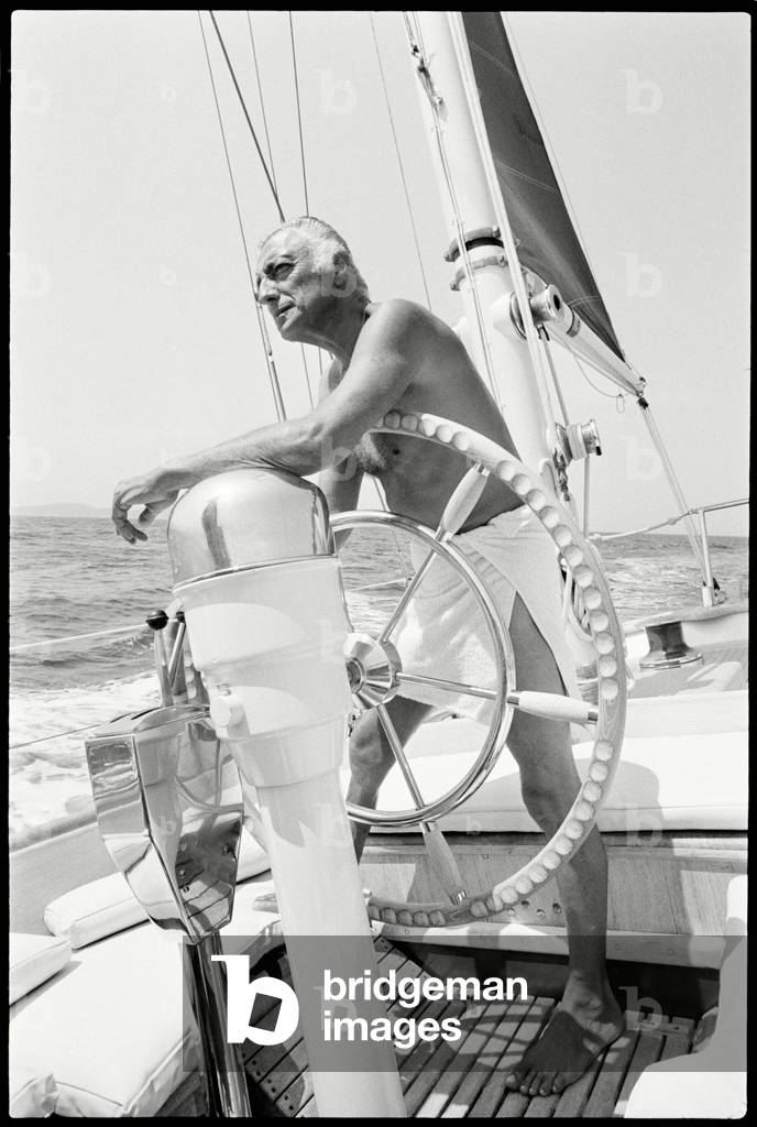 Gianni Agnelli sailing in Corsica, 1975 (b/w photo)