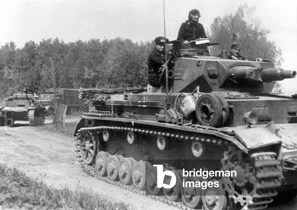 German Panzer IV on the rise in France, 1940 (b/w photo)