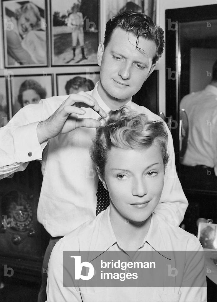 Annabella is styled in the mask, 1938 (b/w photo)