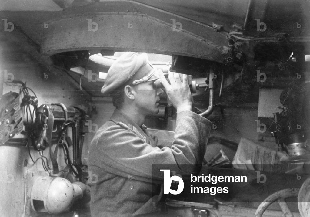 German StuG commander in his tank, 1944 (b/w photo)