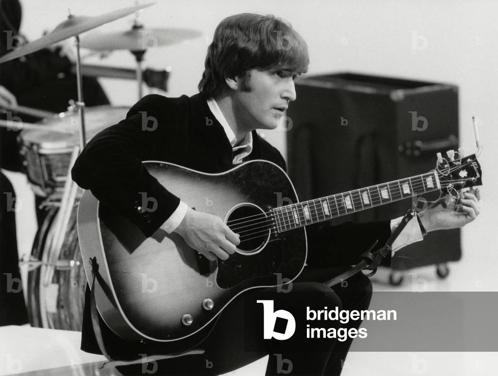 John Lennon of The Beatles during the 'Hard Day's Night' promotion campaign, 1964 (b/w photo)