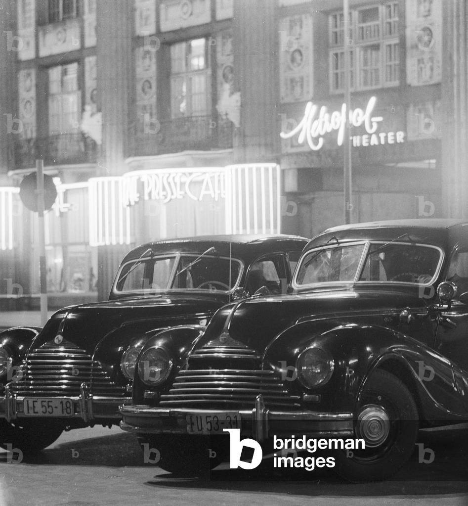 Two EMW 340 / BMW 340 taxis in front of the Metropol Theater on Friedrichstrasse in Berlin, the former capital of the GDR, German Democratic Republic, 1968 (b/w photo)