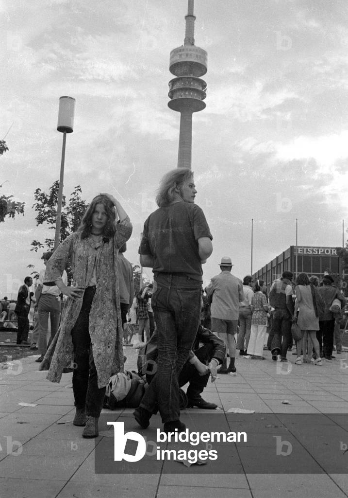 Festival visitors in the Olympic Park in Munich, 1970 (b/w photo)
