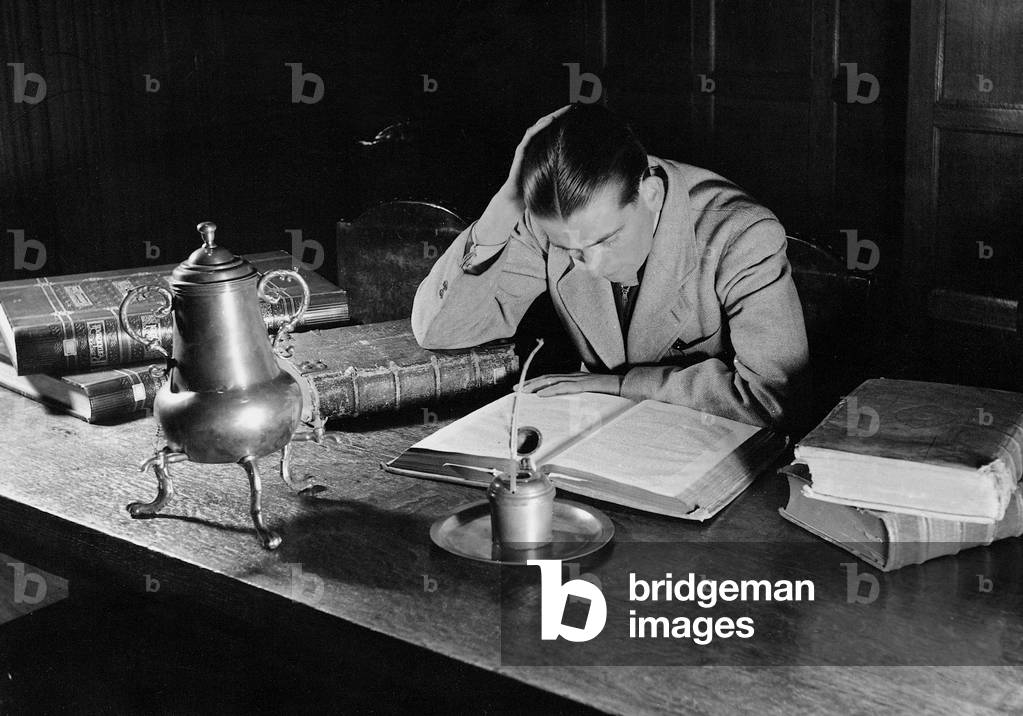 Reader with folios, 1943 (b/w photo)