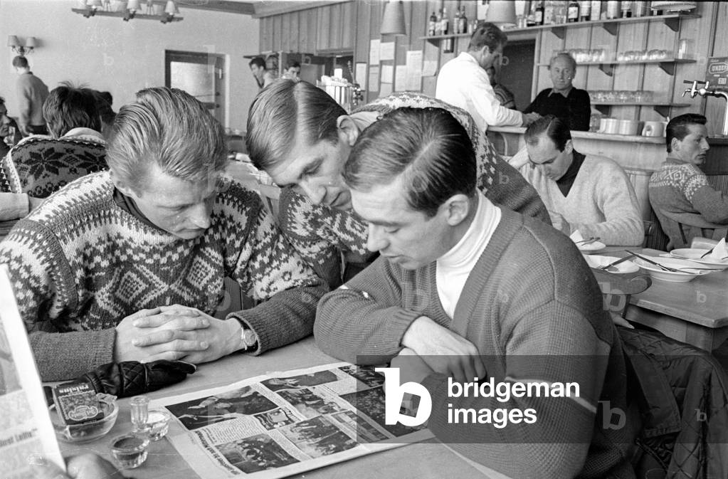Skiers reading in a lounge, 1962 (b/w photo)