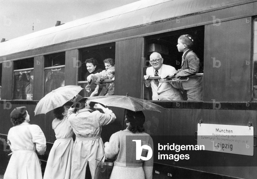 Passengers in an interzonal train, Munich-Leipzic (b/w photo)