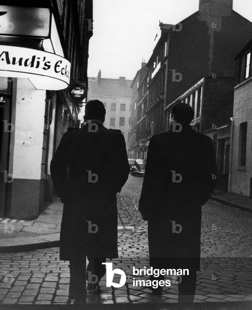 Civilian police officers on the way in St. Pauli, 1958 (b/w photo)