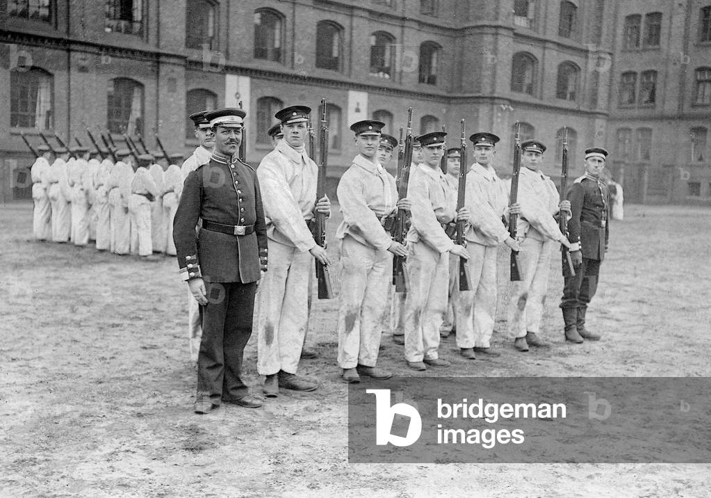 Sea cadets exercise in the barracks, 1903 (b/w photo)