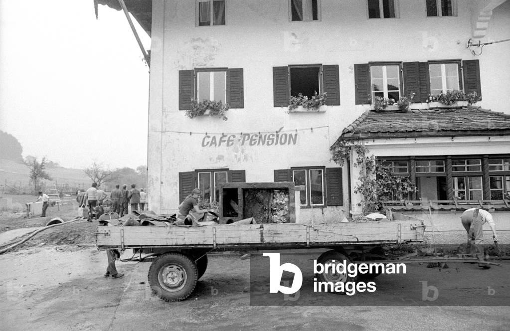 Cleaning up after a storm at Lake Chiemsee, 1974 (b/w photo)