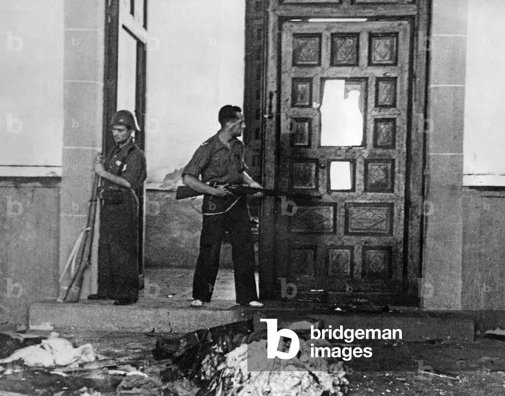 Fighters of the workers' militia examine a garrison in Madrid, 1936