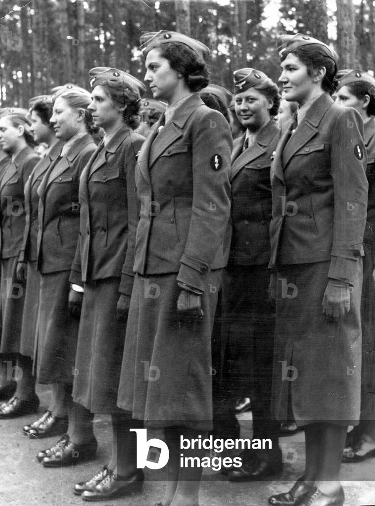The Women's Auxiliary Signal Service members at morning roll call, 1942 (b/w photo)