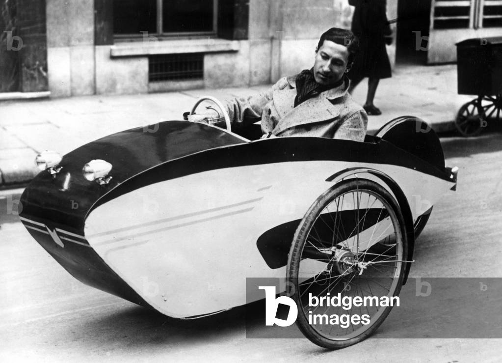 Frenchman in a pedal car, 1941 (b/w photo)