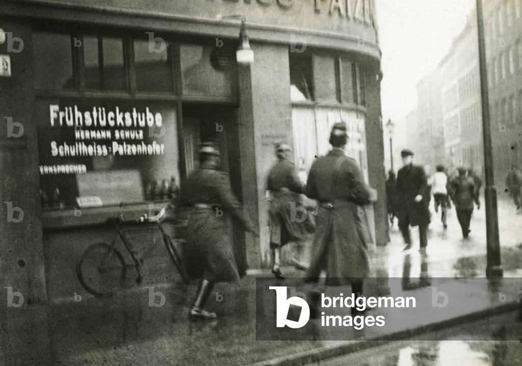 Policemen during a chase at Buelowplatz in Berlin, 1931