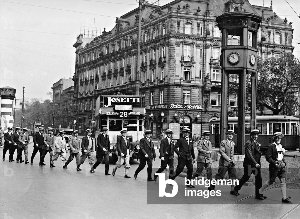 Students in single file on the Potsdamer Square, 1933 (b/w photo)