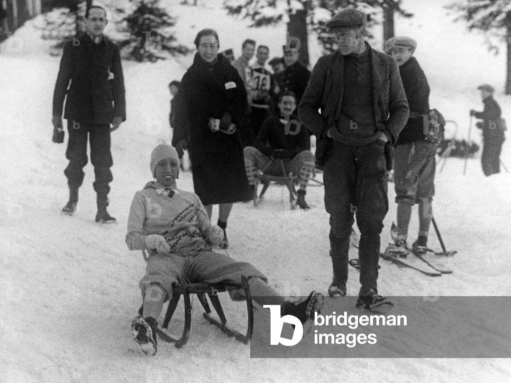 Josephine Baker sledging, 1928 (b/w photo)