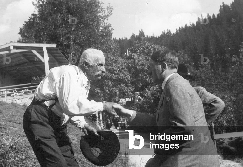 Adolf Hitler during a walk on the Obersalzberg, 1935 (b/w photo)