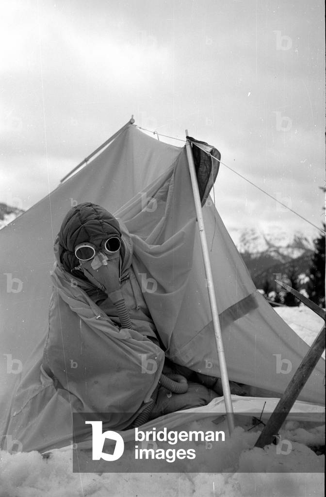 Mountaineer Mathias Rebitsch during preparations, 1954 (b/w photo)