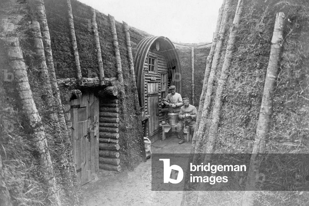 German soldiers in front of their shelter, 1915 (b/w photo)
