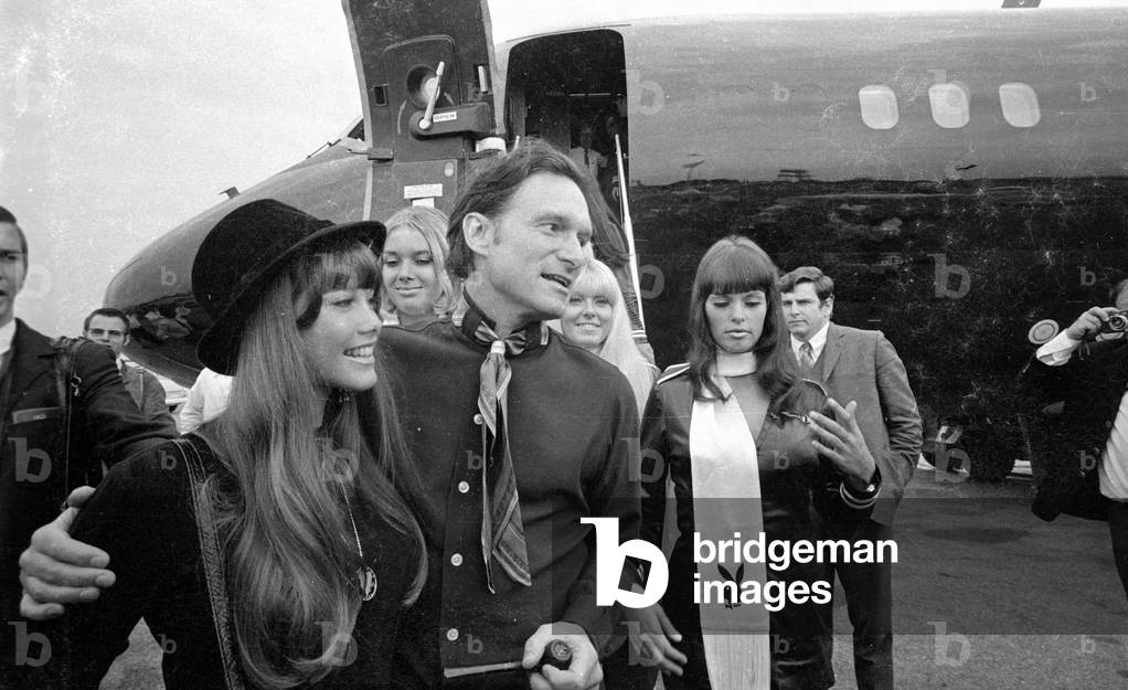 Arrival of Hugh Hefner at the Munich-Riem airport, 1970 (b/w photo)