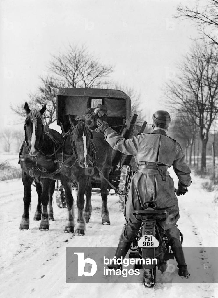 Policeman on a motorcycle, 1939 (b/w photo)