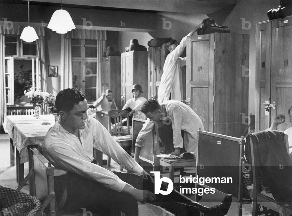 Waking up in a barracks in 'Three Non Coms', 1939 (b/w photo)
