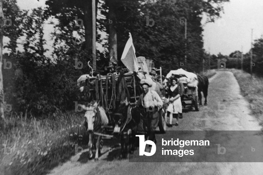 French civilians fleeing, 1944 (b/w photo)