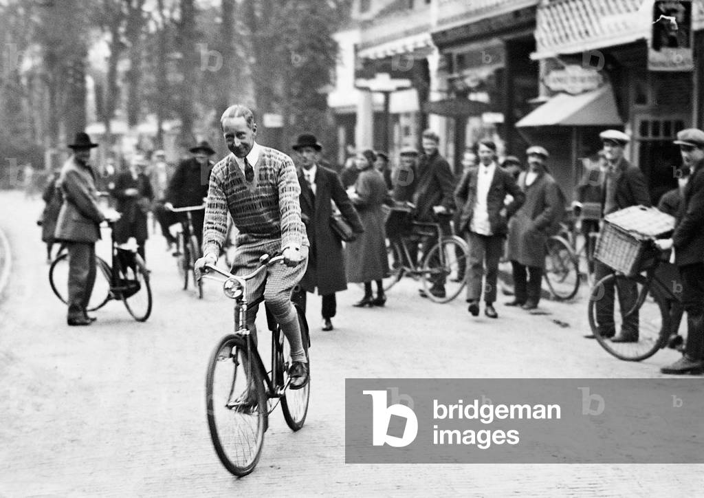 Friedrich Wilhelm of Prussia on a bicycle, 1924 (b/w photo)