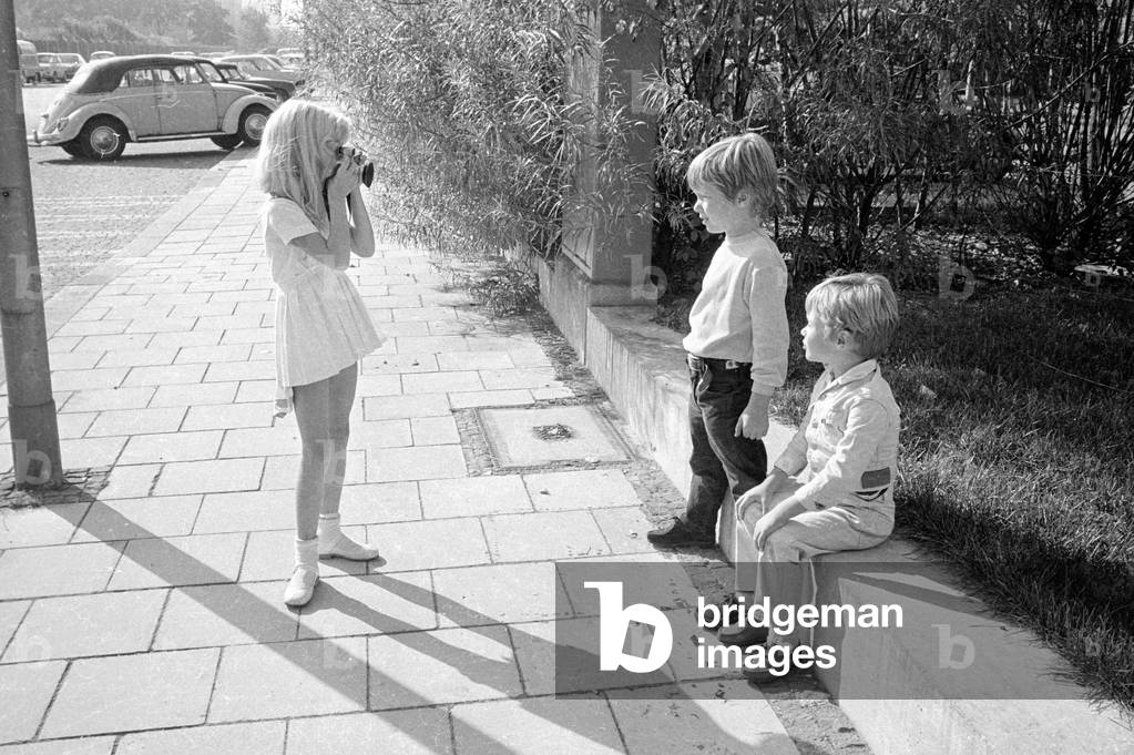 Tommi Ohrner playing with his siblings, 1969 (b/w photo)