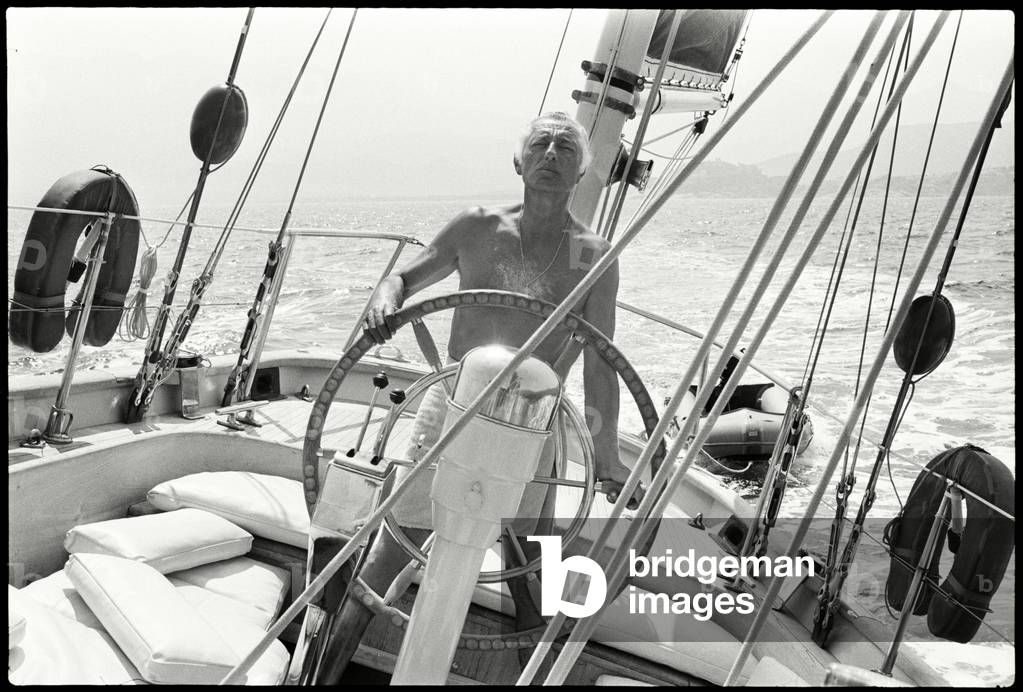 Gianni Agnelli sailing in Corsica, 1975 (b/w photo)