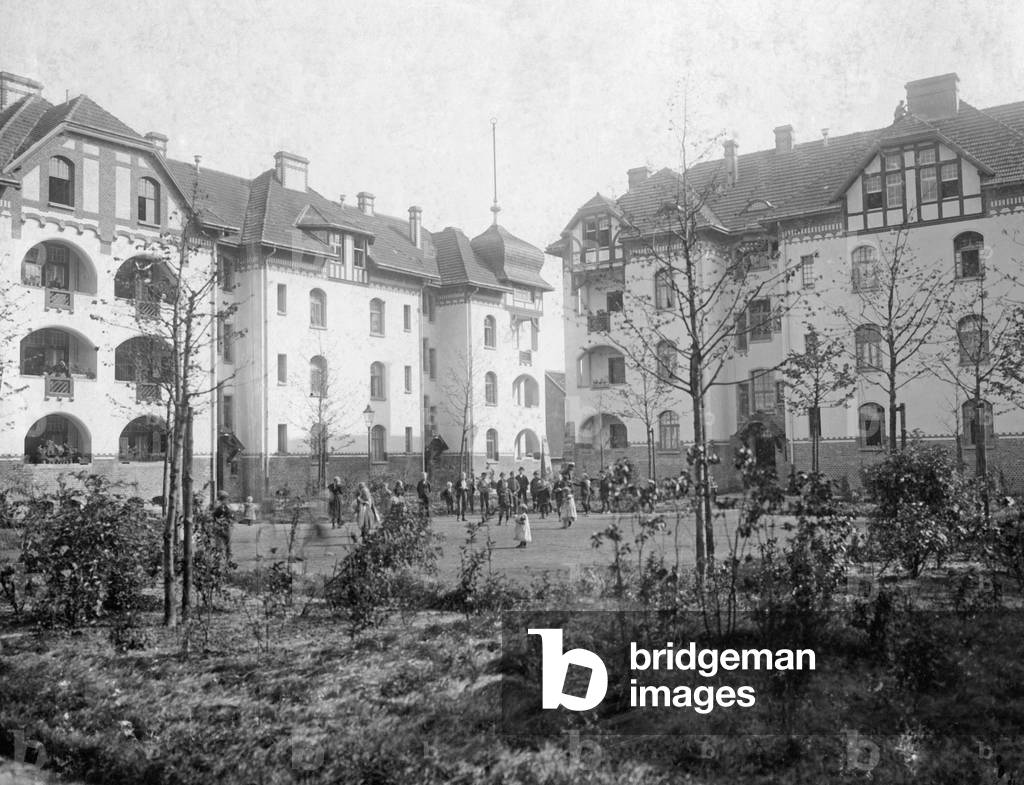 Playground in the workers' colony, c.1905 (b/w photo)